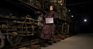 Steampunk dress ensemble for women in burgundy brocade Victorian style with layered skirt